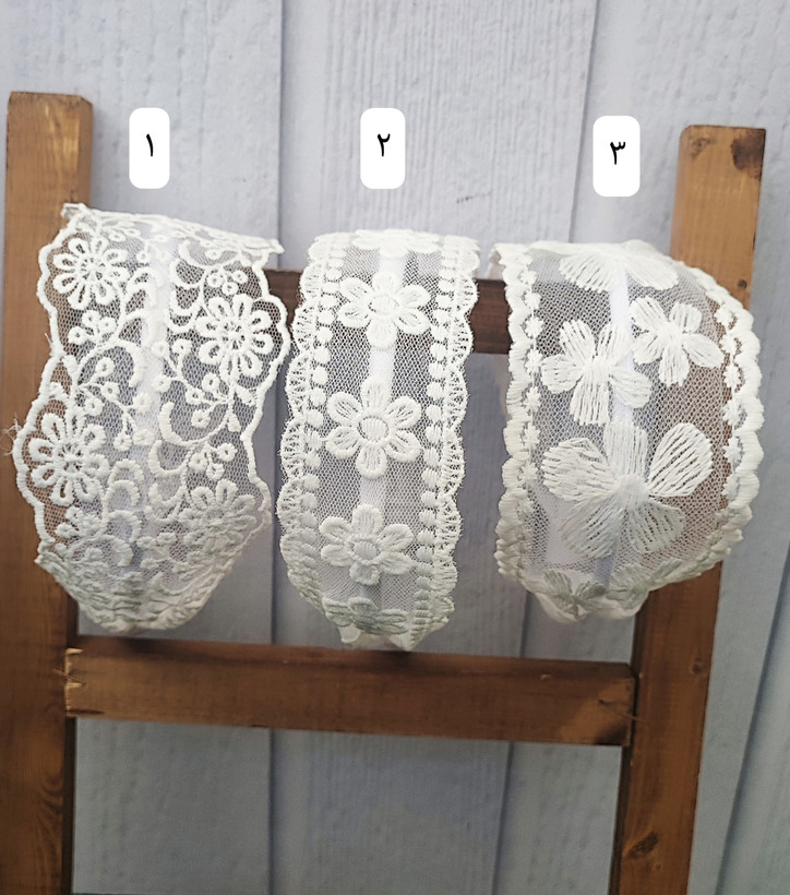 اکسسوری مو؛ تل سر فانتزی طرح گل رنگ سفید و مشکی